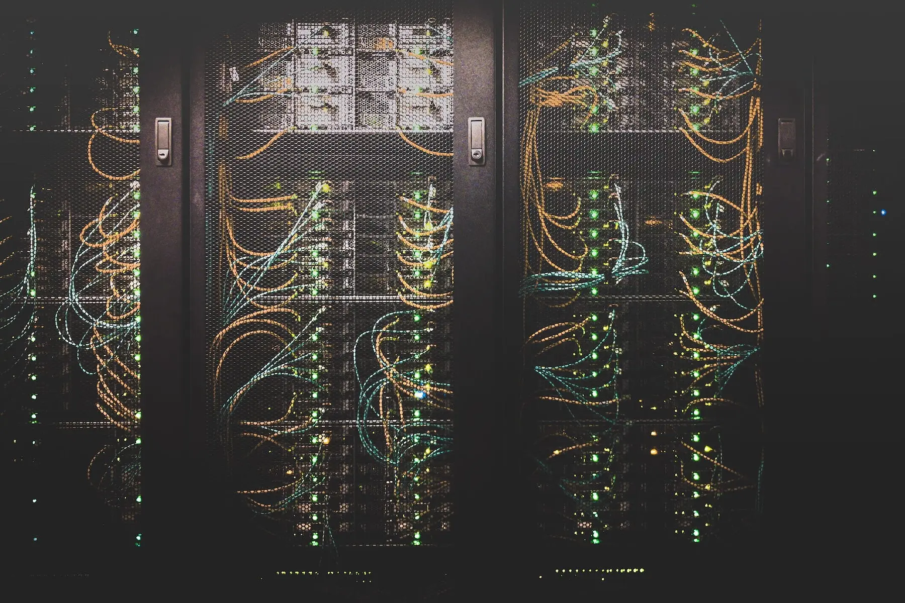Data center racks with network cables and lights